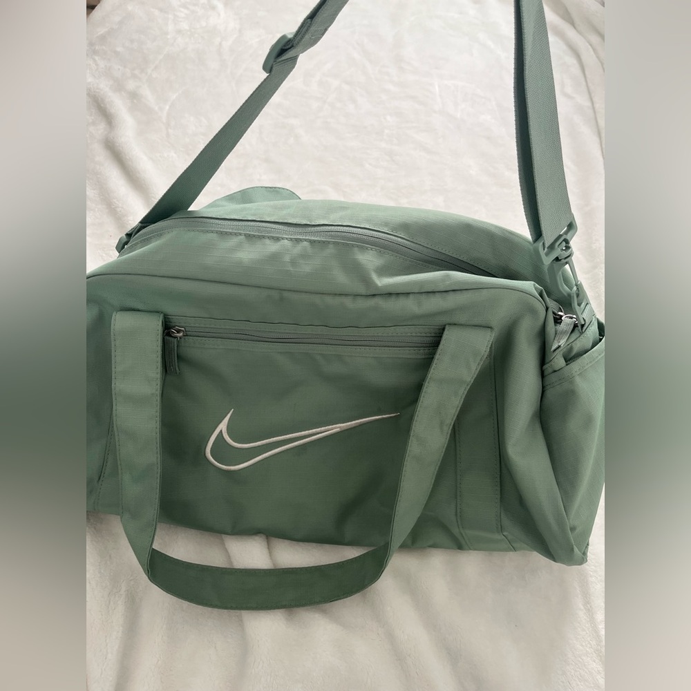 Green Nike duffel bag